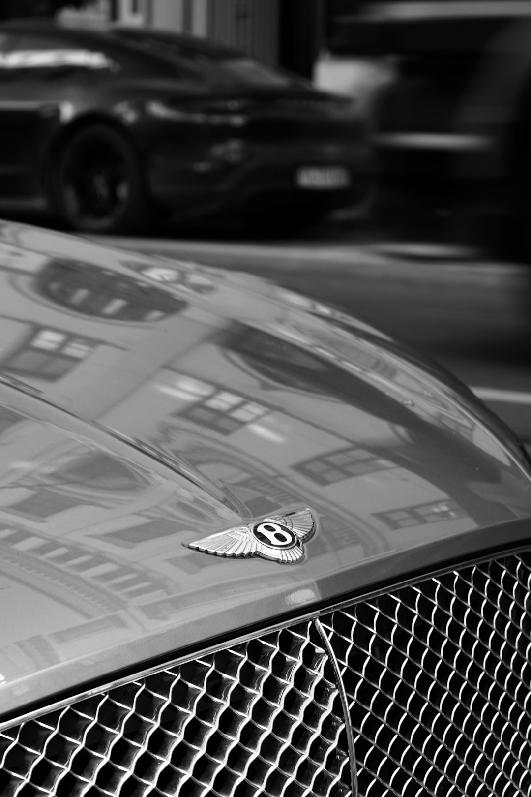 Bentley spottet by Athletic Brands a close up of the hood of a car