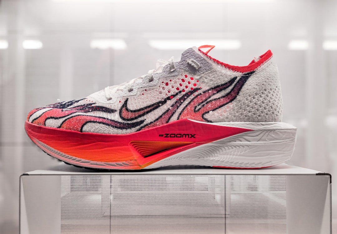 A pair of shoes on display in a glass case