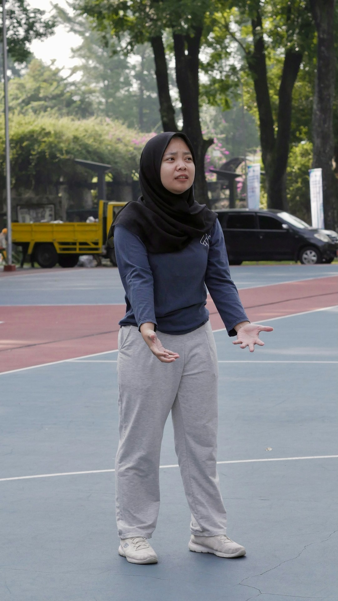 Frequently Asked Questions (FAQ) 🤔 by Athletic Brands A woman standing on top of a tennis court holding a racquet